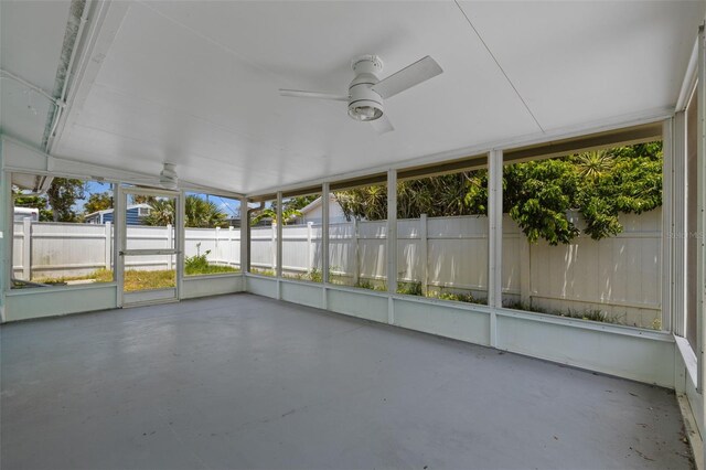 2302 16th St W, Palmetto, FL 34221 - unfurnished sunroom featuring a ceiling fan