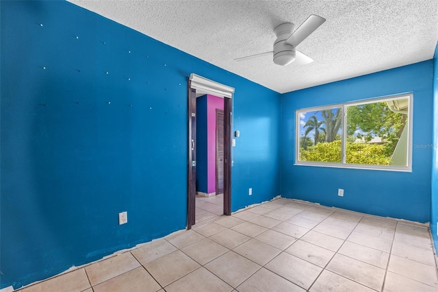 2302 16th St W, Palmetto, FL 34221 - tiled spare room with a textured ceiling and a ceiling fan