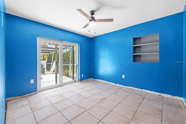 2302 16th St W, Palmetto, FL 34221 - tiled spare room featuring built in features and a ceiling fan
