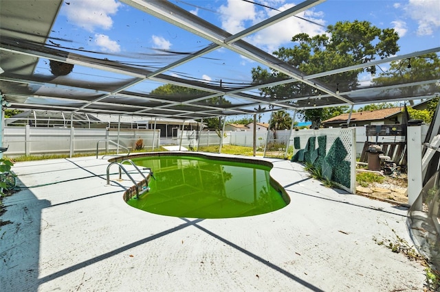 2302 16th St W, Palmetto, FL 34221 - view of swimming pool with a patio, a fenced backyard, and a lanai