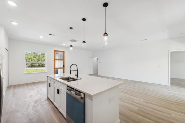 3072 SW 168th Loop, Ocala, FL 34473 - kitchen featuring a sink, dishwashing machine, light wood-style floors, baseboards, and recessed lighting