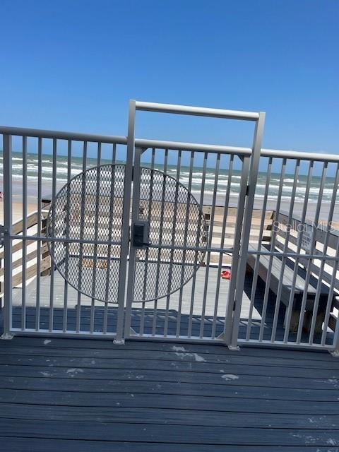 4453 S Atlantic Ave Unit 602, Ponce Inlet, FL 32127 - gate with view of water and beach