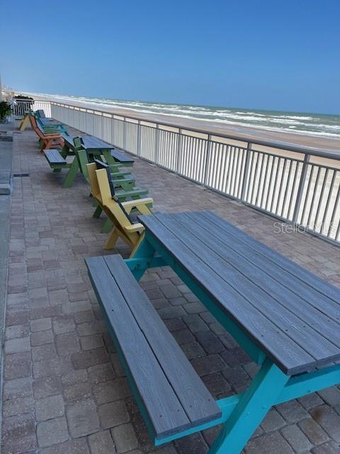 4453 S Atlantic Ave Unit 602, Ponce Inlet, FL 32127 - deck featuring view of water and beach
