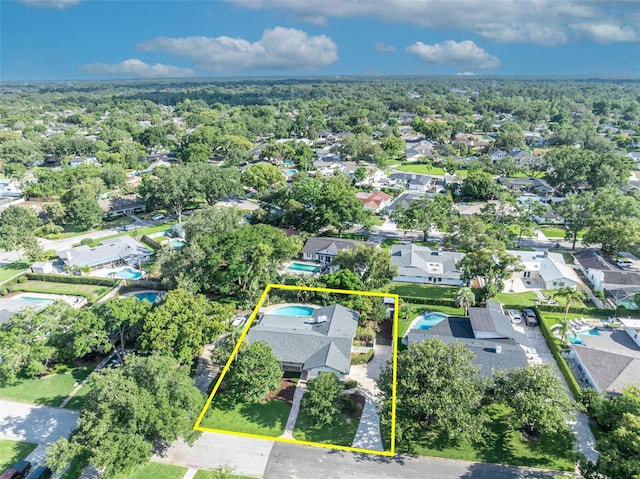 aerial view of residential area with property boundaries highlighted