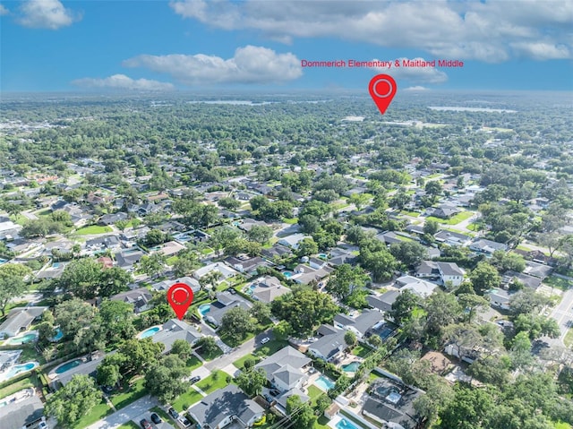aerial view of property's location featuring nearby suburban area