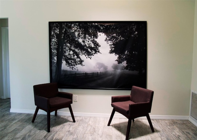 548 Glen Haven Dr, Deltona, FL 32738 - sitting room featuring wood finished floors and baseboards