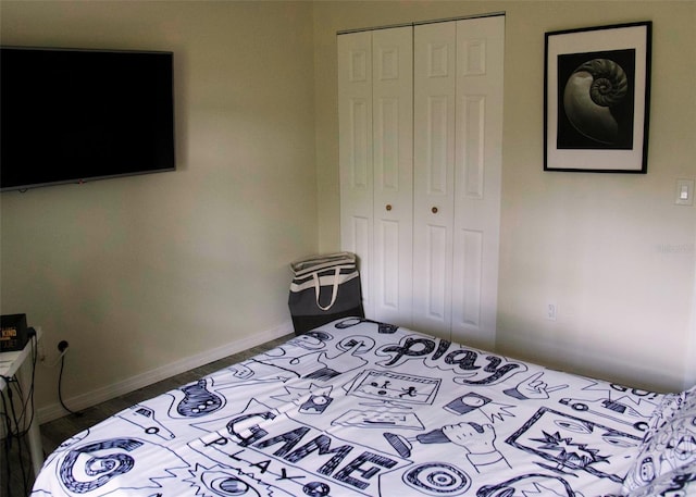 548 Glen Haven Dr, Deltona, FL 32738 - bedroom with a closet and baseboards