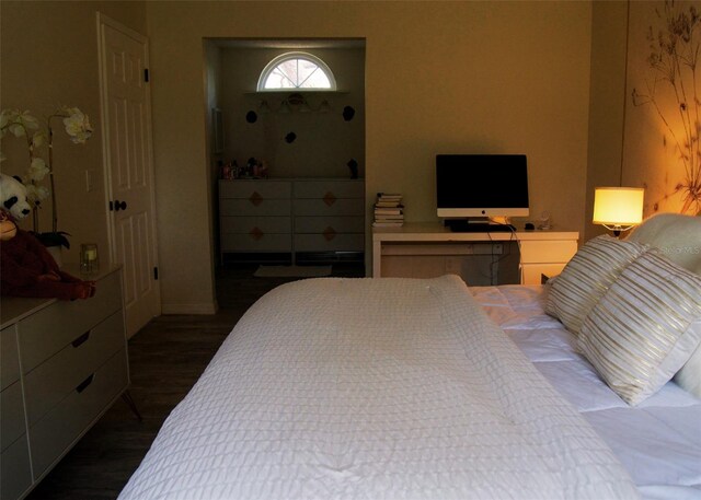 548 Glen Haven Dr, Deltona, FL 32738 - bedroom with wood finished floors and baseboards