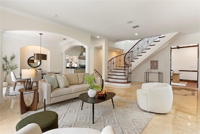 1010 Terrace Blvd, Orlando, FL 32803 - living area with ornate columns, arched walkways, stairway, ornamental molding, and recessed lighting