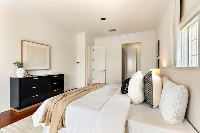 1010 Terrace Blvd, Orlando, FL 32803 - bedroom with ornamental molding and wood finished floors