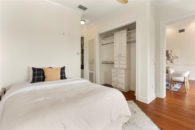 1010 Terrace Blvd, Orlando, FL 32803 - bedroom featuring ornamental molding, dark wood-style floors, a closet, and baseboards
