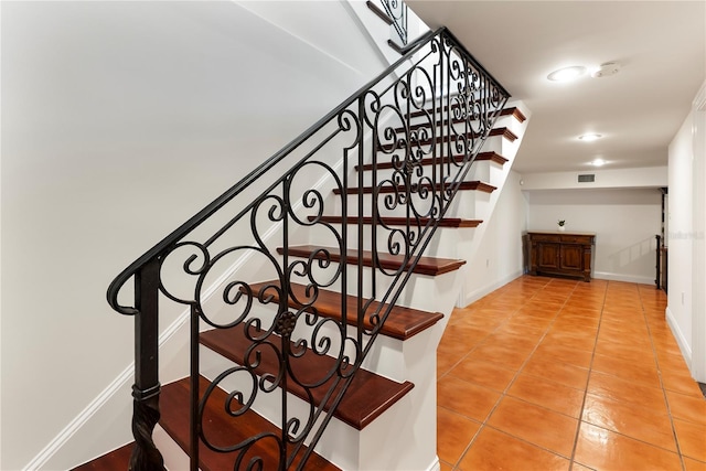 1010 Terrace Blvd, Orlando, FL 32803 - stairway with tile patterned floors and baseboards