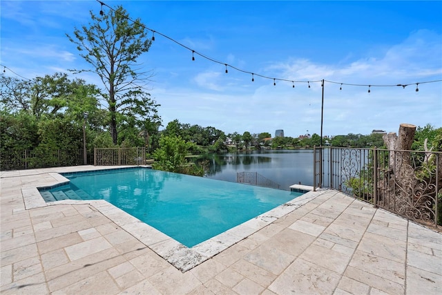 1010 Terrace Blvd, Orlando, FL 32803 - view of swimming pool featuring a patio and a water view