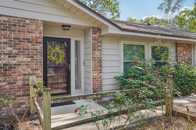 921 Torchwood Dr, Deland, FL 32724 - property entrance featuring brick siding
