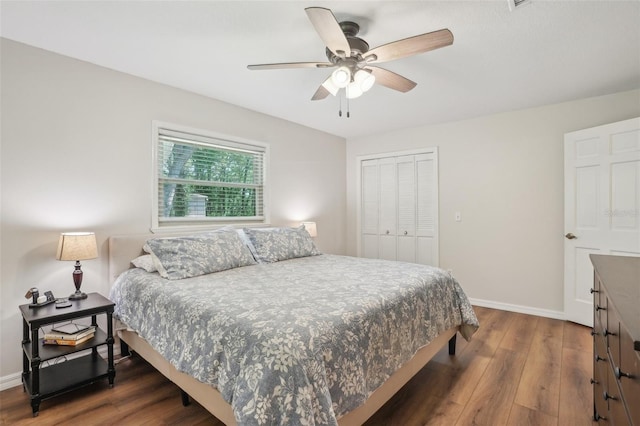 921 Torchwood Dr, Deland, FL 32724 - bedroom with wood finished floors, a closet, baseboards, and a ceiling fan