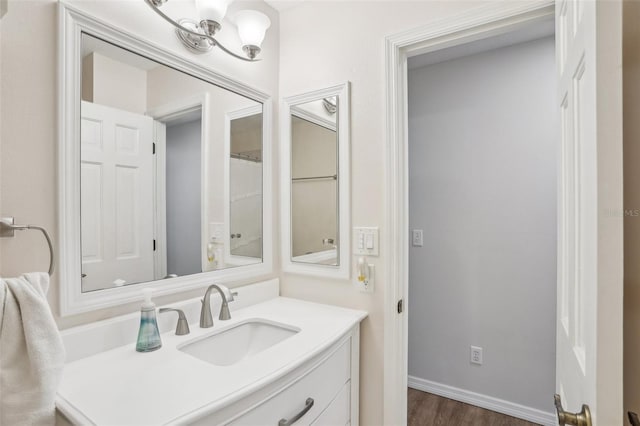 921 Torchwood Dr, Deland, FL 32724 - bathroom featuring wood finished floors and vanity