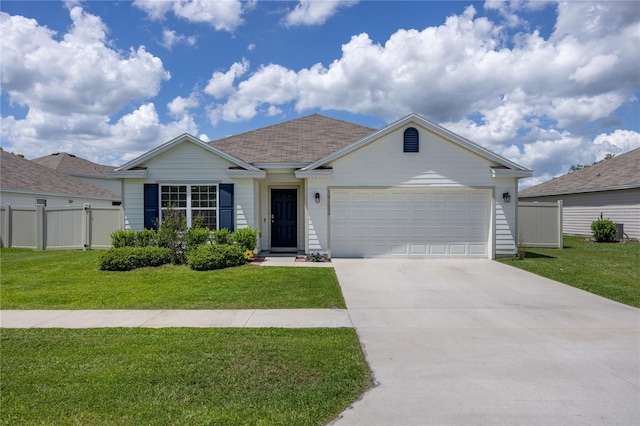 single story home with an attached garage and driveway