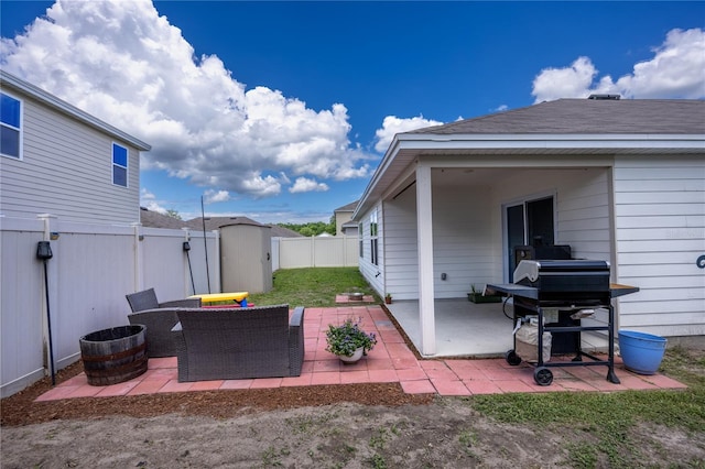 view of patio featuring a fenced backyard and grilling area