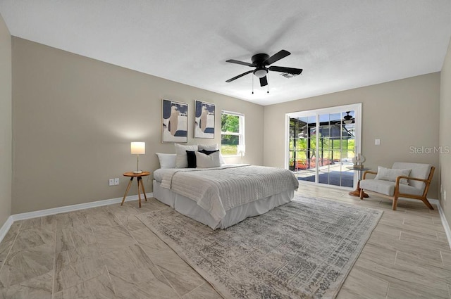 10545 Parkway Dr, Clermont, FL 34711 - bedroom with access to outside, baseboards, and a ceiling fan