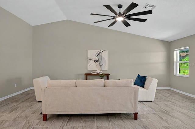 10545 Parkway Dr, Clermont, FL 34711 - living room featuring lofted ceiling, a ceiling fan, and baseboards