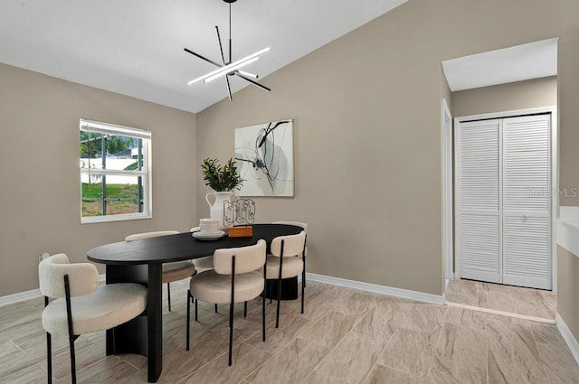10545 Parkway Dr, Clermont, FL 34711 - dining area with baseboards, vaulted ceiling, and a chandelier