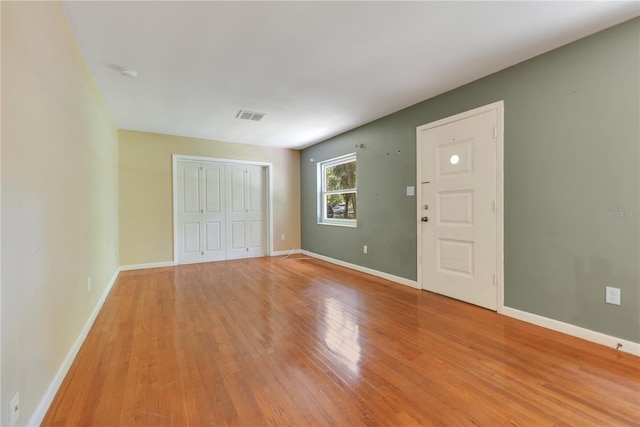 12046 SE 135th Ave, Ocklawaha, FL 32179 - entrance foyer with light wood-style floors and baseboards