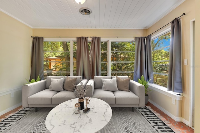 12046 SE 135th Ave, Ocklawaha, FL 32179 - sunroom / solarium featuring baseboards, wooden ceiling, and ornamental molding