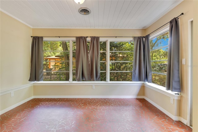 12046 SE 135th Ave, Ocklawaha, FL 32179 - unfurnished sunroom featuring baseboards and wood ceiling