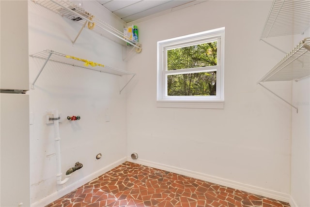 12046 SE 135th Ave, Ocklawaha, FL 32179 - clothes washing area featuring baseboards, gas dryer hookup, and washer hookup