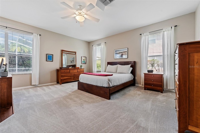 10030 Chatham Oaks Ct, Orlando, FL 32836 - bedroom featuring light carpet, baseboards, and a ceiling fan
