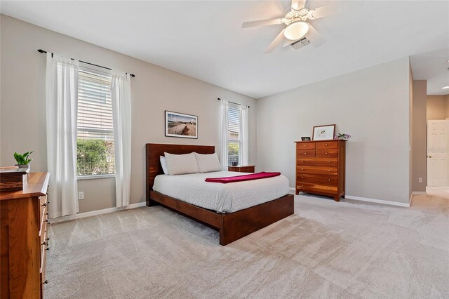 10030 Chatham Oaks Ct, Orlando, FL 32836 - bedroom with light carpet, baseboards, and ceiling fan