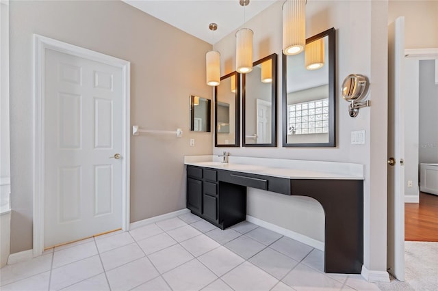 10030 Chatham Oaks Ct, Orlando, FL 32836 - bathroom with vanity and baseboards