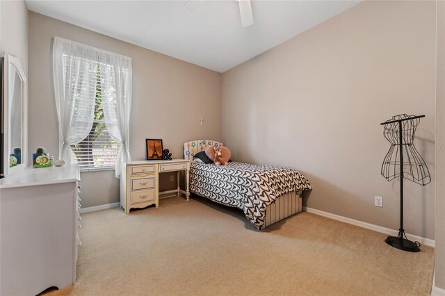 10030 Chatham Oaks Ct, Orlando, FL 32836 - bedroom featuring light colored carpet, baseboards, and ceiling fan