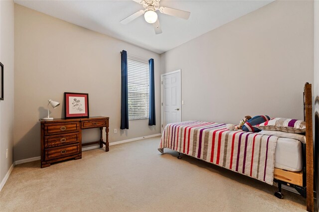 10030 Chatham Oaks Ct, Orlando, FL 32836 - bedroom with carpet floors, baseboards, and a ceiling fan