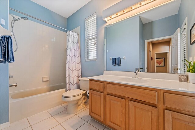 10030 Chatham Oaks Ct, Orlando, FL 32836 - full bathroom featuring tile patterned flooring, shower / bath combo with shower curtain, vanity, and toilet