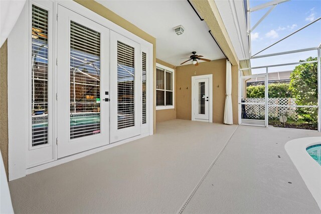 10030 Chatham Oaks Ct, Orlando, FL 32836 - view of patio / terrace featuring ceiling fan, french doors, a lanai, and a pool