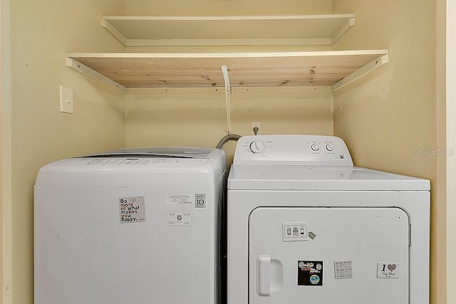 200 Maitland Ave Unit 122, Altamonte Springs, FL 32701 - washroom featuring washer and dryer