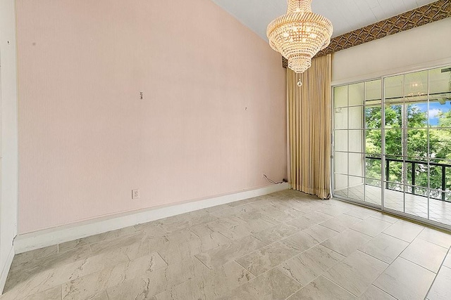 200 Maitland Ave Unit 122, Altamonte Springs, FL 32701 - spare room featuring a chandelier and baseboards