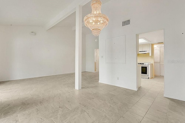 200 Maitland Ave Unit 122, Altamonte Springs, FL 32701 - unfurnished living room featuring a chandelier, a high ceiling, and beam ceiling