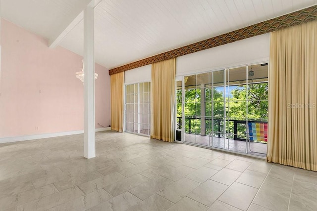 200 Maitland Ave Unit 122, Altamonte Springs, FL 32701 - empty room featuring baseboards and beam ceiling