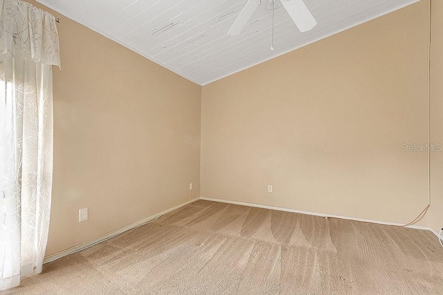 200 Maitland Ave Unit 122, Altamonte Springs, FL 32701 - unfurnished room featuring light colored carpet, vaulted ceiling, baseboards, and ceiling fan