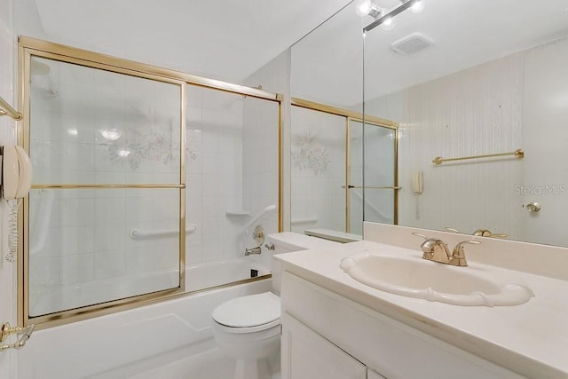 200 Maitland Ave Unit 122, Altamonte Springs, FL 32701 - full bathroom featuring toilet, vanity, and enclosed tub / shower combo