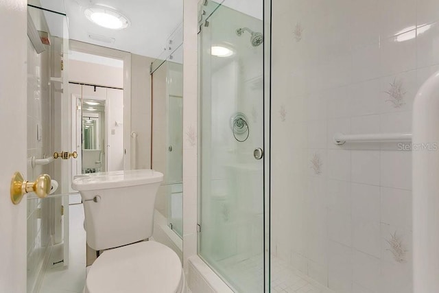 200 Maitland Ave Unit 122, Altamonte Springs, FL 32701 - bathroom featuring a stall shower and toilet