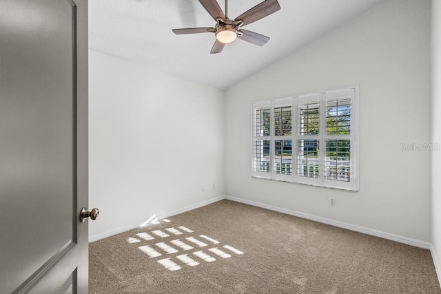 25 Reflections Village Dr, Ormond Beach, FL 32174 - spare room with carpet floors, ceiling fan, lofted ceiling, and baseboards