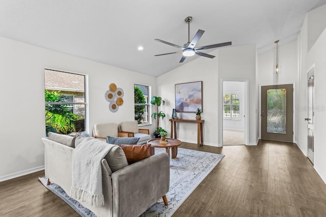 25 Reflections Village Dr, Ormond Beach, FL 32174 - living area featuring lofted ceiling, ceiling fan, wood finished floors, and baseboards