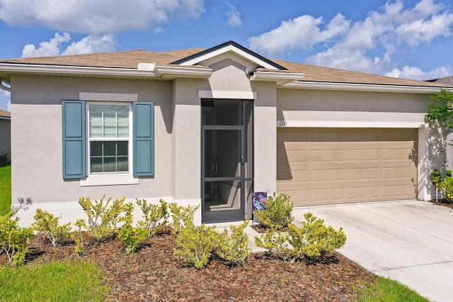 200 Summershore Dr, Auburndale, FL 33823 - single story home with driveway, a garage, stucco siding, and a shingled roof