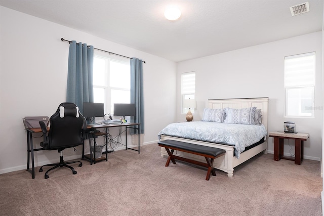 200 Summershore Dr, Auburndale, FL 33823 - carpeted bedroom with an office area and baseboards