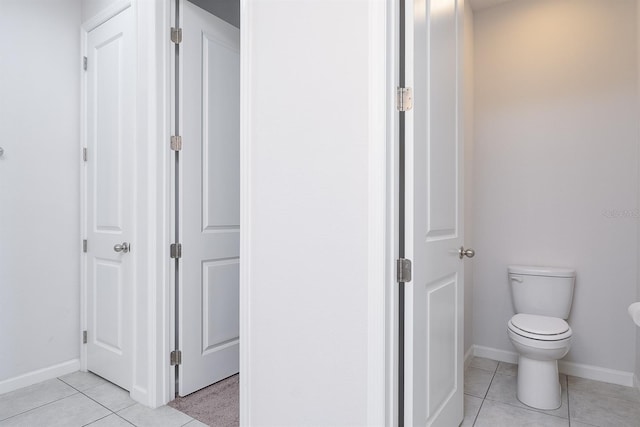 200 Summershore Dr, Auburndale, FL 33823 - bathroom featuring tile patterned flooring, baseboards, and toilet