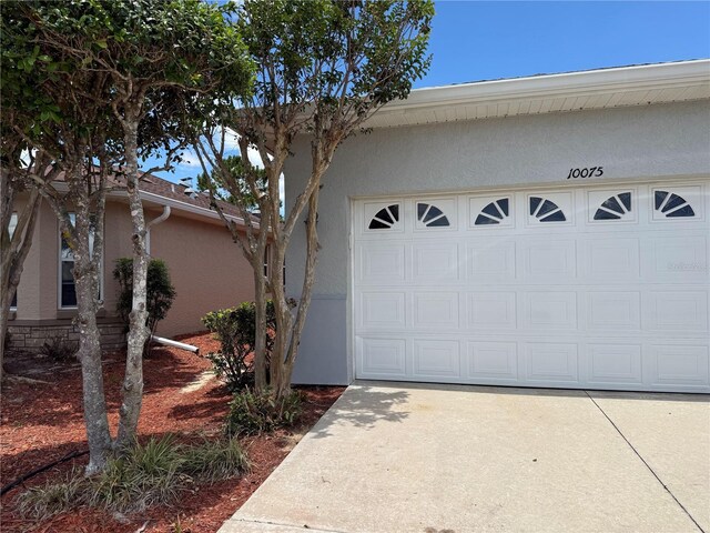 10075 SW 91st Pl, Ocala, FL 34481 - garage with driveway