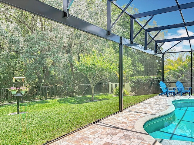 unfurnished sunroom with a swimming pool
